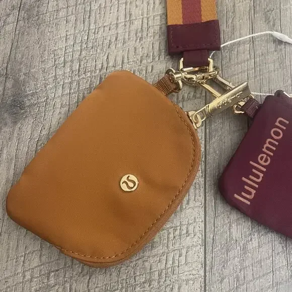 Lululemon Dual Pouch Wristlet Wallet Keychain Maroon Gold Tan Wordmark Strap